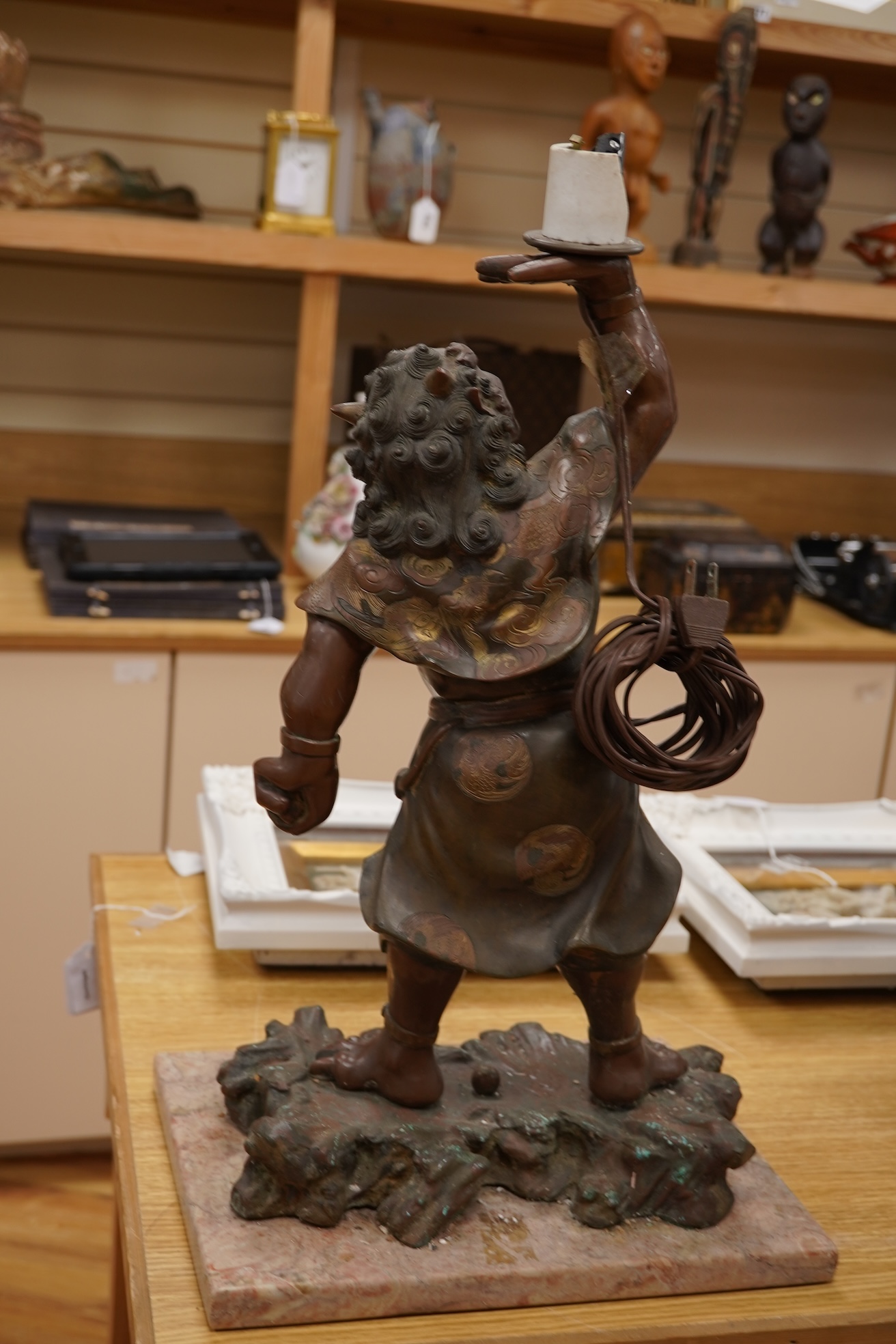 A Japanese bronze model of an oni, Meiji period, now mounted as a lamp, 50cm
